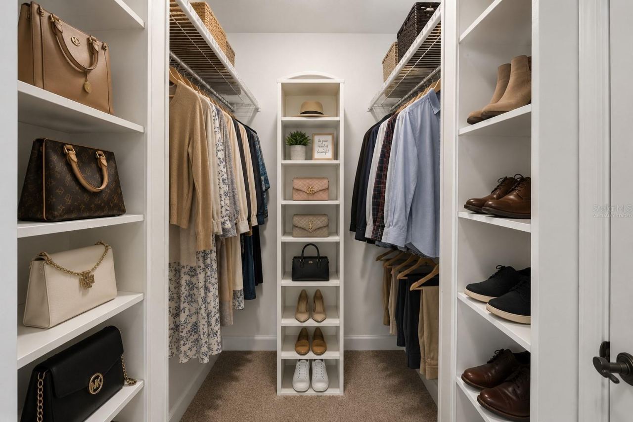 Photo 18 of 20: PRIMARY WALK-IN CLOSET- virtually staged