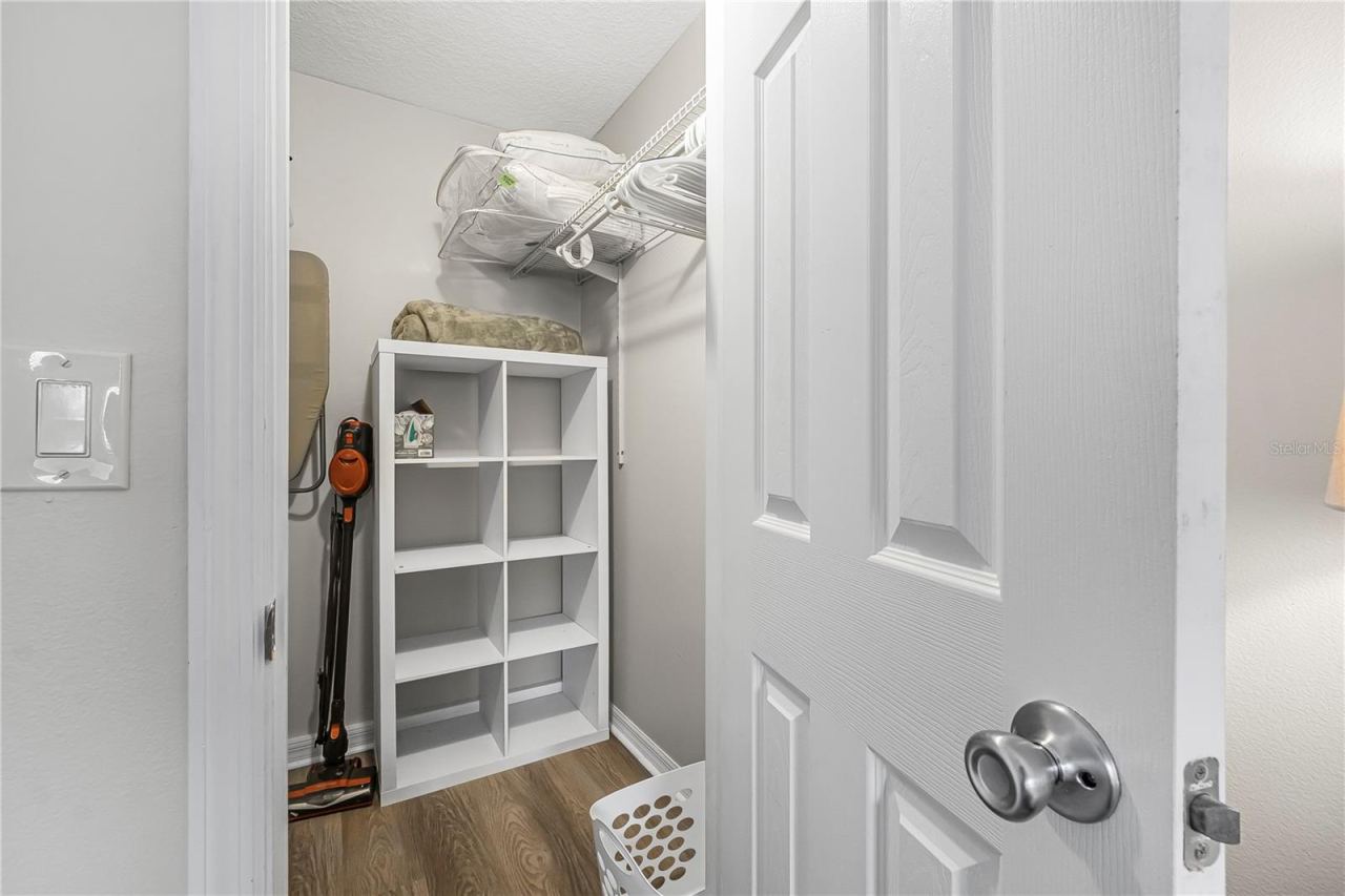 Photo 12 of 20: Primary Bedroom Walk-in Closet