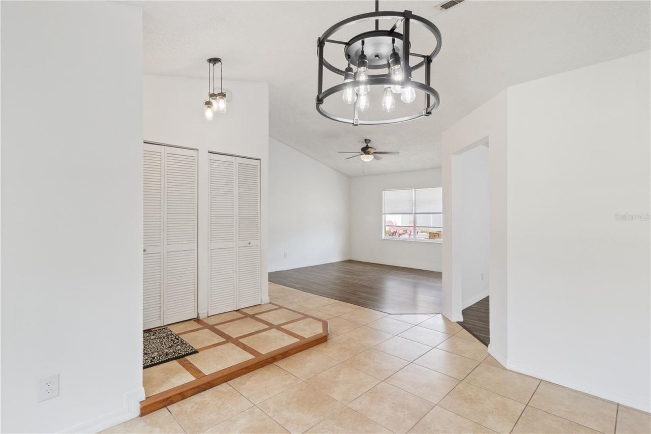 Photo 4 of 20: View from Dining Area into Living Room and Entry