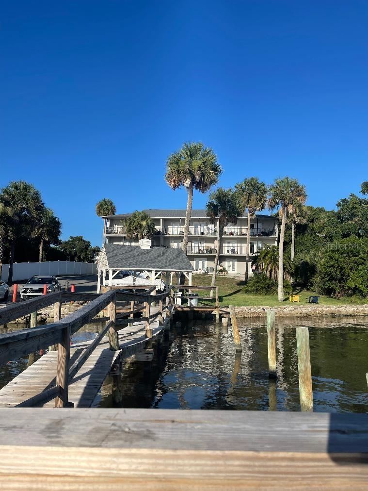 Photo 14 of 16: View from dock to side of building