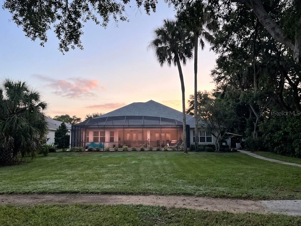 Photo 18 of 20: Prime ICW Location Featuring A Full-Length Screened Porch Perfectly Positioned To Catch The Morning Sun Over The water.
