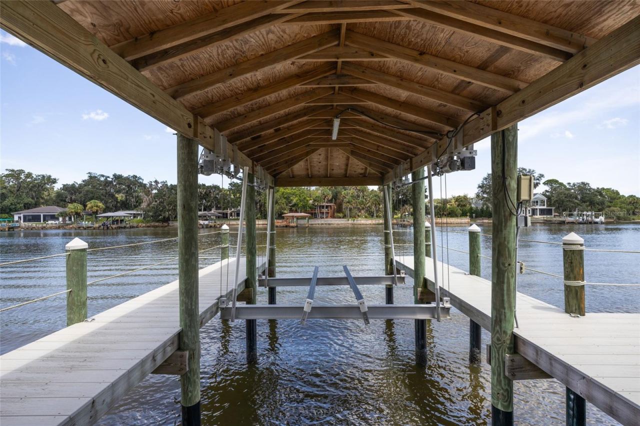 Photo 4 of 20: Private Dock And Boathouse Equipped With Heavy Duty 10,000 LB Electric Lift