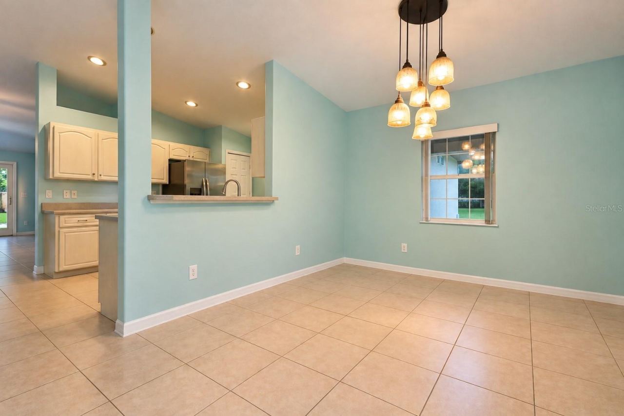 Photo 11 of 20: Front room can be a family room or formal dining area.