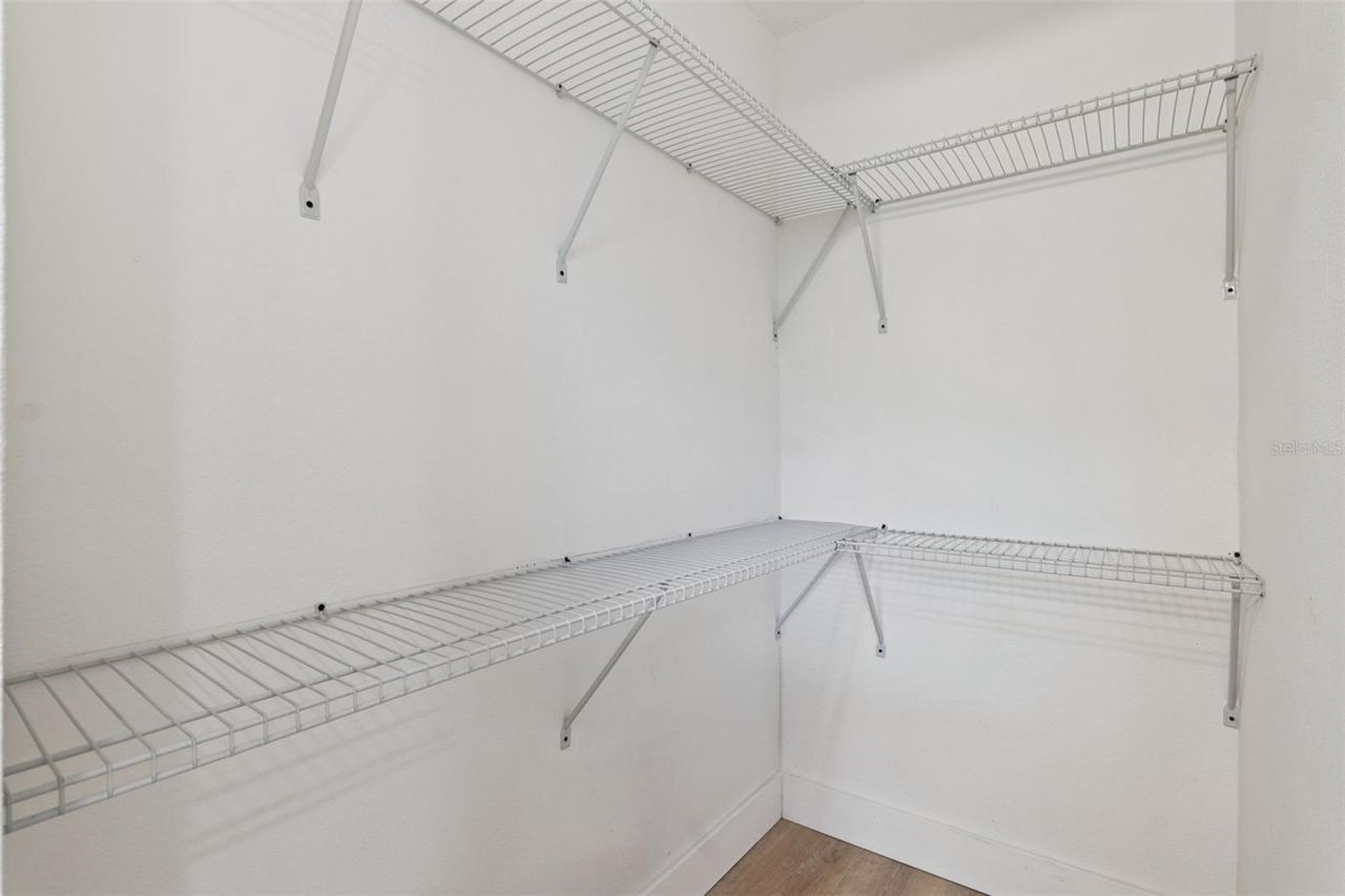 Photo 14 of 20: Primary Closet Walk-in